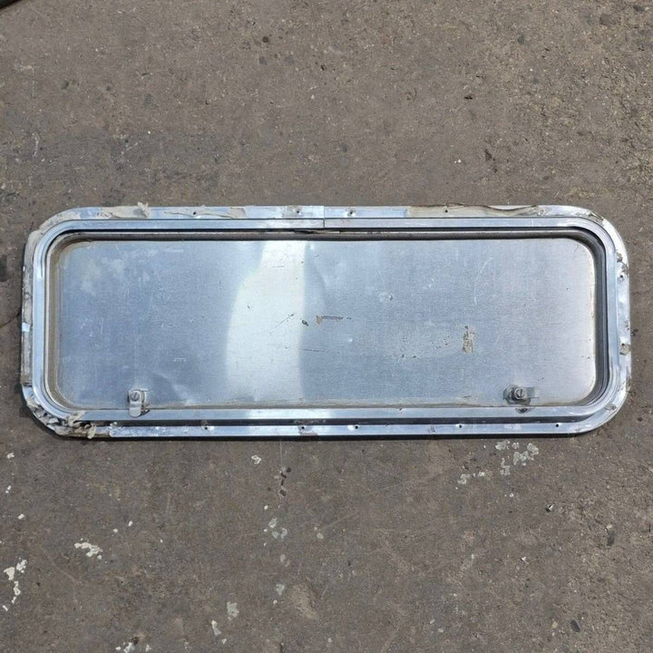 Used Radius Cornered Cargo Door - 31.75 X 11 X 0.75 - Young Farts RV Parts