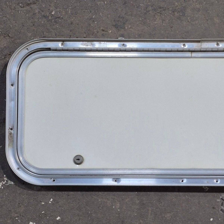 Used Radius Cornered Cargo Door - 31.75 X 11 X 0.75 - Young Farts RV Parts