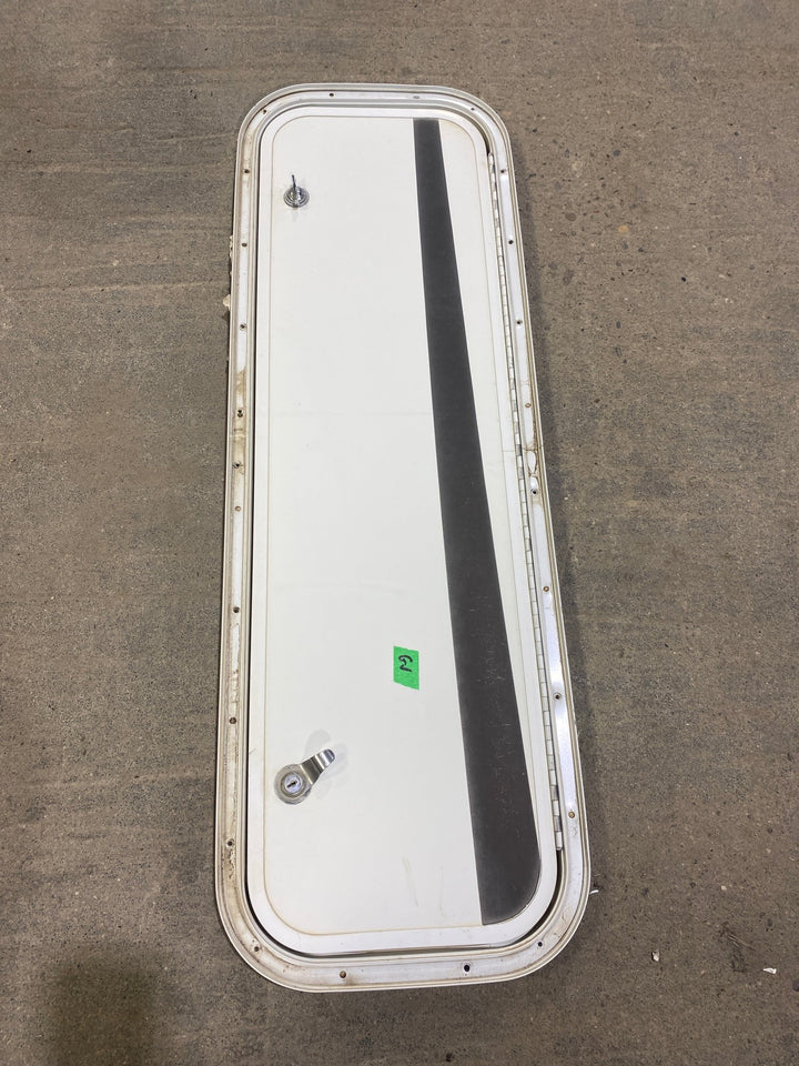 Used Radius Cornered Cargo Door 35 3/4" W x 10 3/4" H x 3/4" D - Young Farts RV Parts