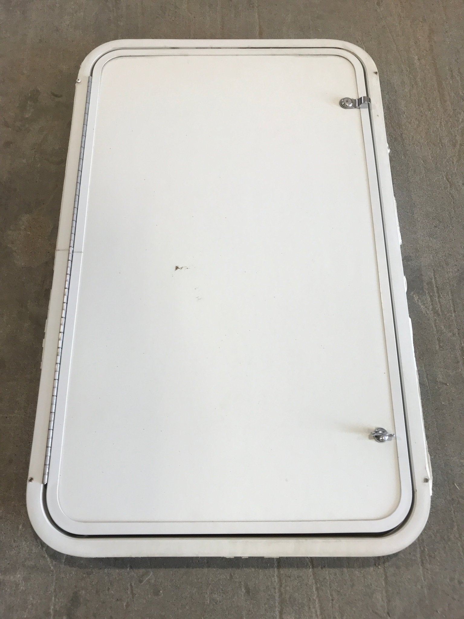 Used Radius Cornered Cargo Door 35 3/4" W x 21 1/2" H x 2" D - Young Farts RV Parts