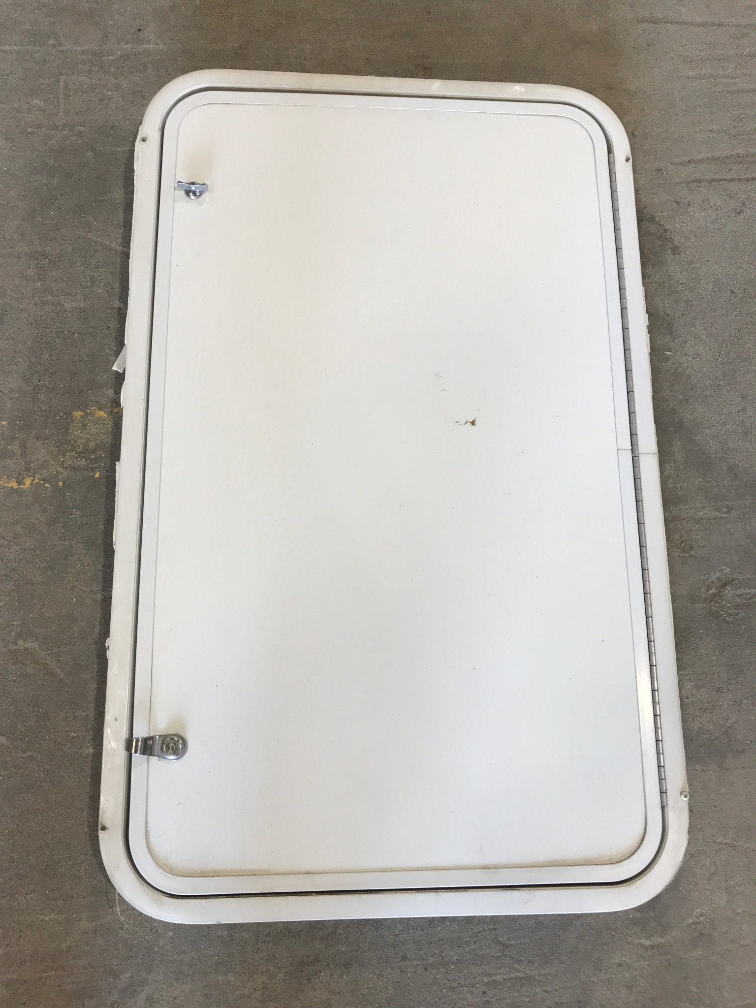 Used Radius Cornered Cargo Door 35 3/4" W x 21 1/2" H x 2" D - Young Farts RV Parts