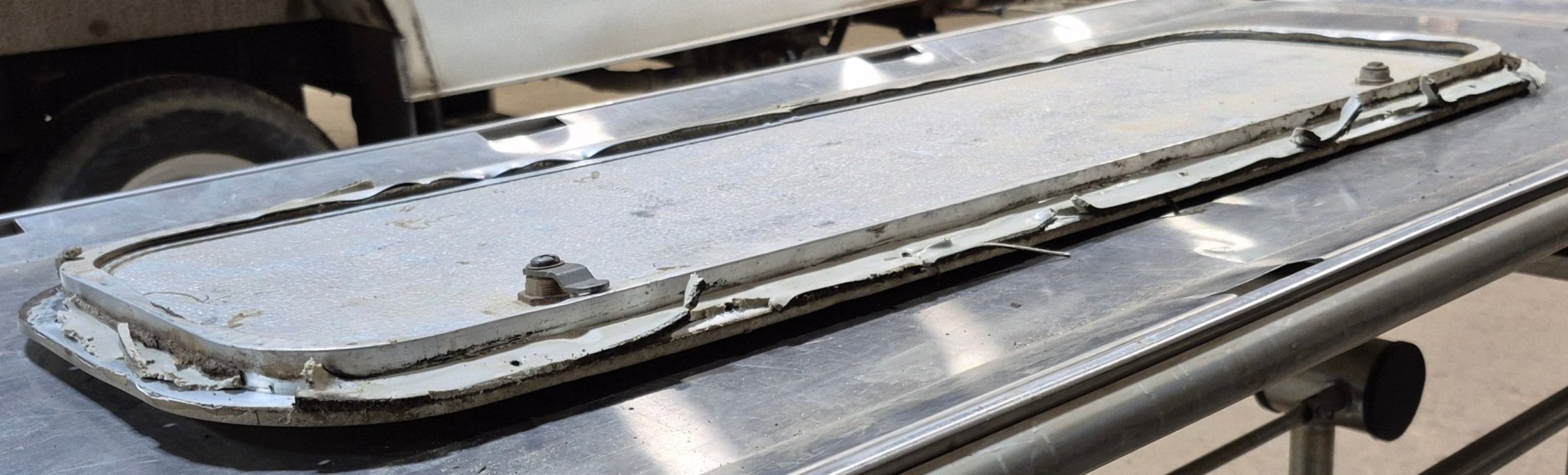 Used Radius Cornered Cargo Door 35 3/4" x 10 7/8" x 1/2" - Young Farts RV Parts