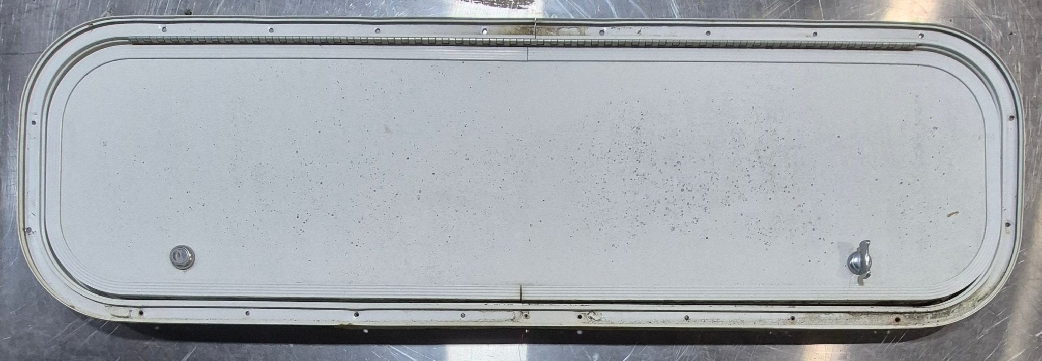 Used Radius Cornered Cargo Door 35 3/4" x 9 7/8" x 1/2" - Young Farts RV Parts