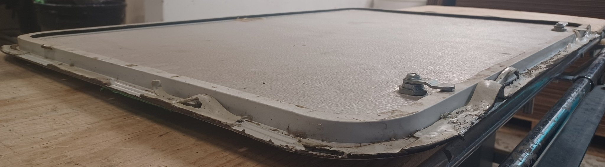 Used Radius Cornered Cargo Door 35 7/8" x 23 1/2" x 5/8" D - Young Farts RV Parts