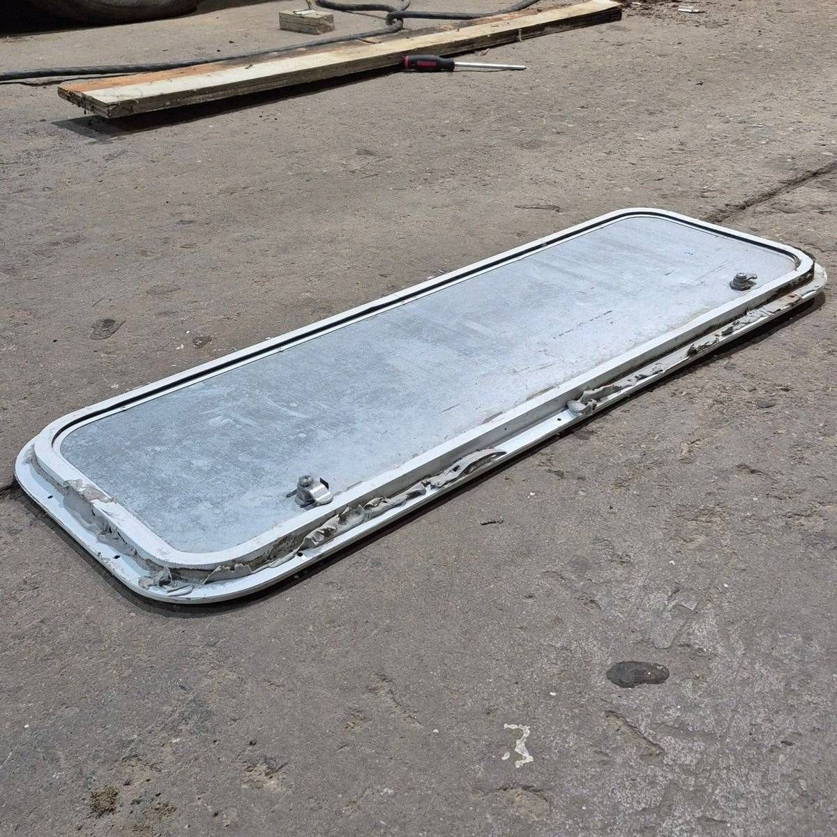 Used Radius Cornered Cargo Door - 35.875 X 11.875 X 0.625 - Young Farts RV Parts