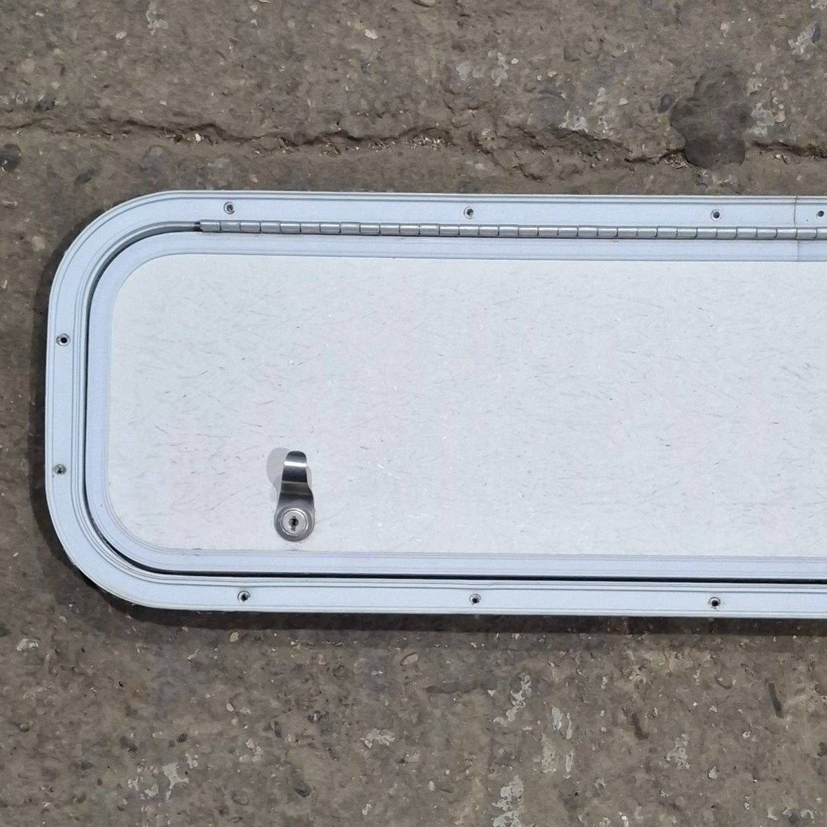 Used Radius Cornered Cargo Door - 35.875 X 9.125 X 0.625 - Young Farts RV Parts