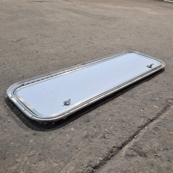 Used Radius Cornered Cargo Door - 36" X 10 7/8" X 3/4" - Young Farts RV Parts