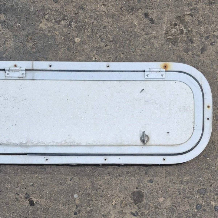 Used Radius Cornered Cargo Door - 37 7/8" X 8 7/8" X 1/2" - Young Farts RV Parts