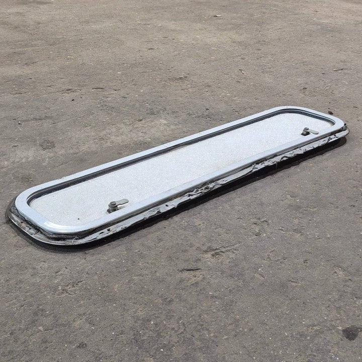 Used Radius Cornered Cargo Door - 37 7/8" X 8 7/8" X 1/2" - Young Farts RV Parts