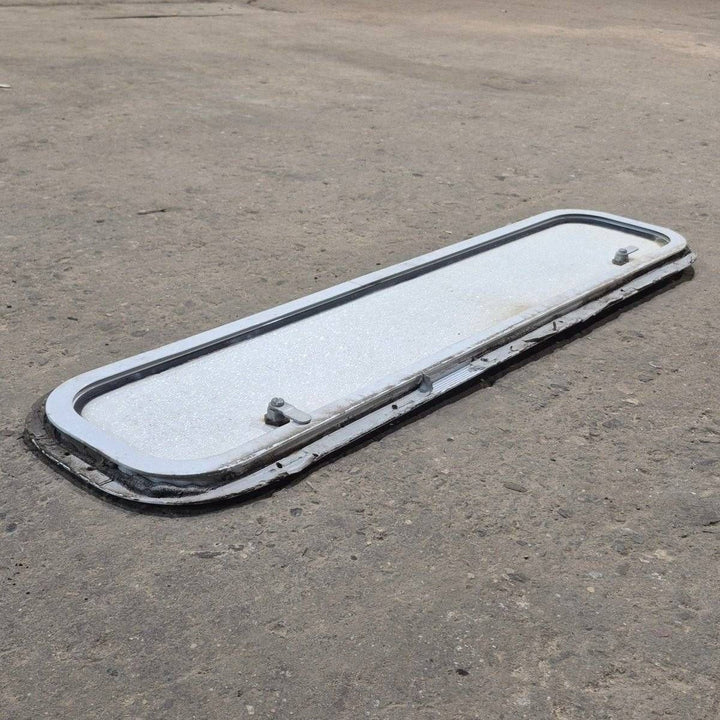 Used Radius Cornered Cargo Door - 37 7/8" X 8 7/8" X 1/2" - Young Farts RV Parts