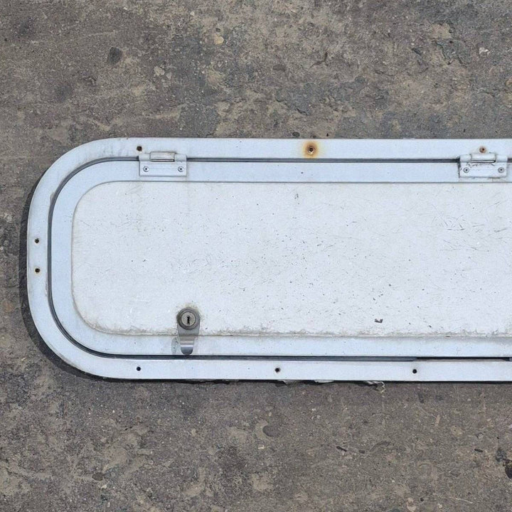 Used Radius Cornered Cargo Door - 37 7/8" X 8 7/8" X 1/2" - Young Farts RV Parts