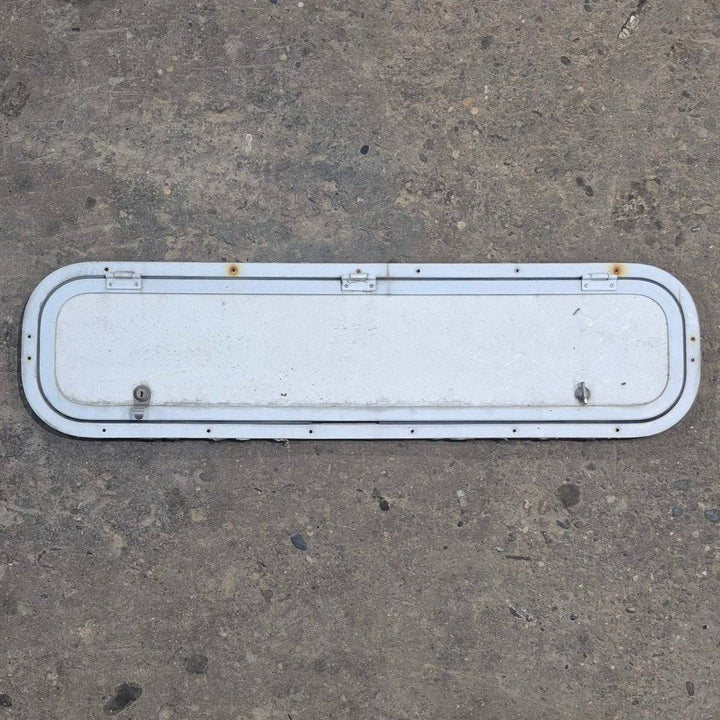 Used Radius Cornered Cargo Door - 37 7/8" X 8 7/8" X 1/2" - Young Farts RV Parts