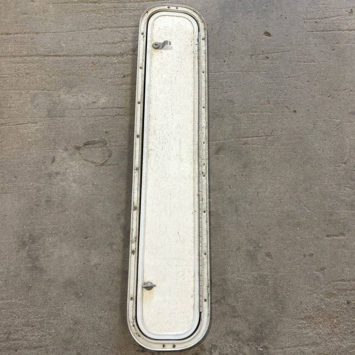Used Radius Cornered Cargo Door - 39.0 X 6.875 X .75 - Young Farts RV Parts