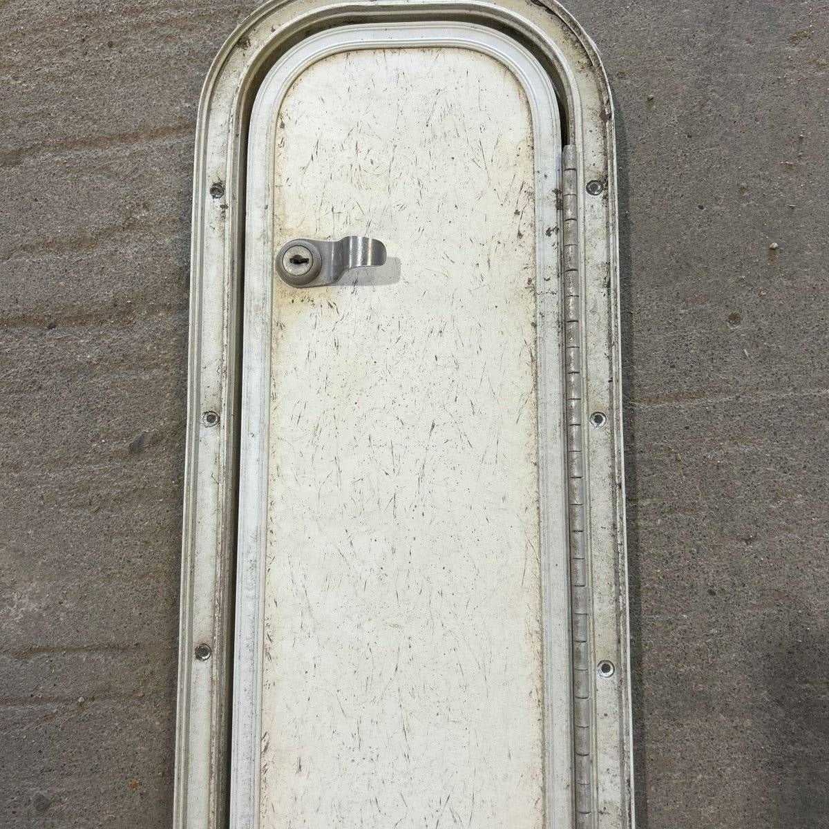 Used Radius Cornered Cargo Door - 39.0 X 6.875 X .75 - Young Farts RV Parts