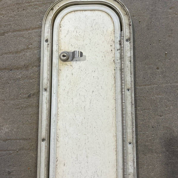 Used Radius Cornered Cargo Door - 39.0 X 6.875 X .75 - Young Farts RV Parts