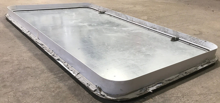 Used Radius Cornered Cargo Door 41 3/4" x 22 3/4" x 1 7/8" D - Young Farts RV Parts