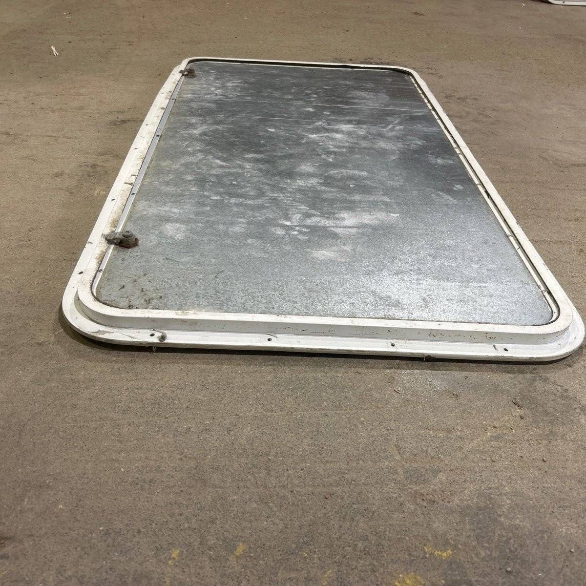 Used Radius Cornered Cargo Door - 41.75 X 22.75 X 0.625 - Young Farts RV Parts