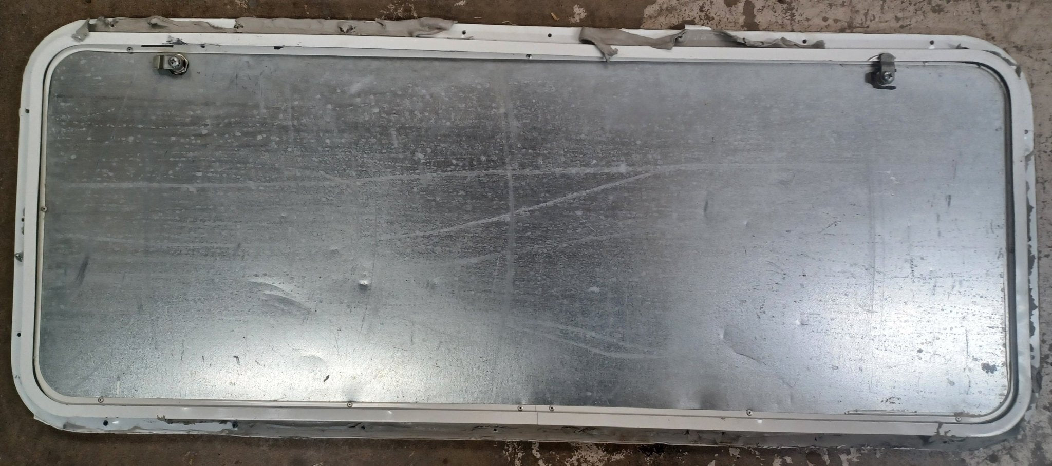 Used Radius Cornered Cargo Door 45 1/4" x 17 1/2" x 5/8"D - Young Farts RV Parts