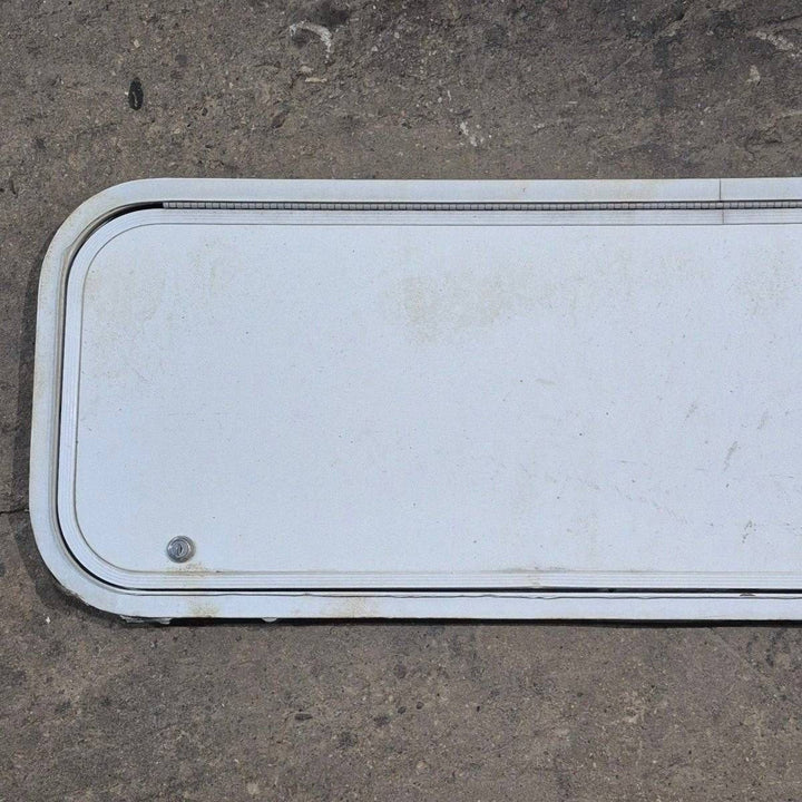 Used Radius Cornered Cargo Door - 45 7/8" X 13 3/4" X 1/2" - Young Farts RV Parts