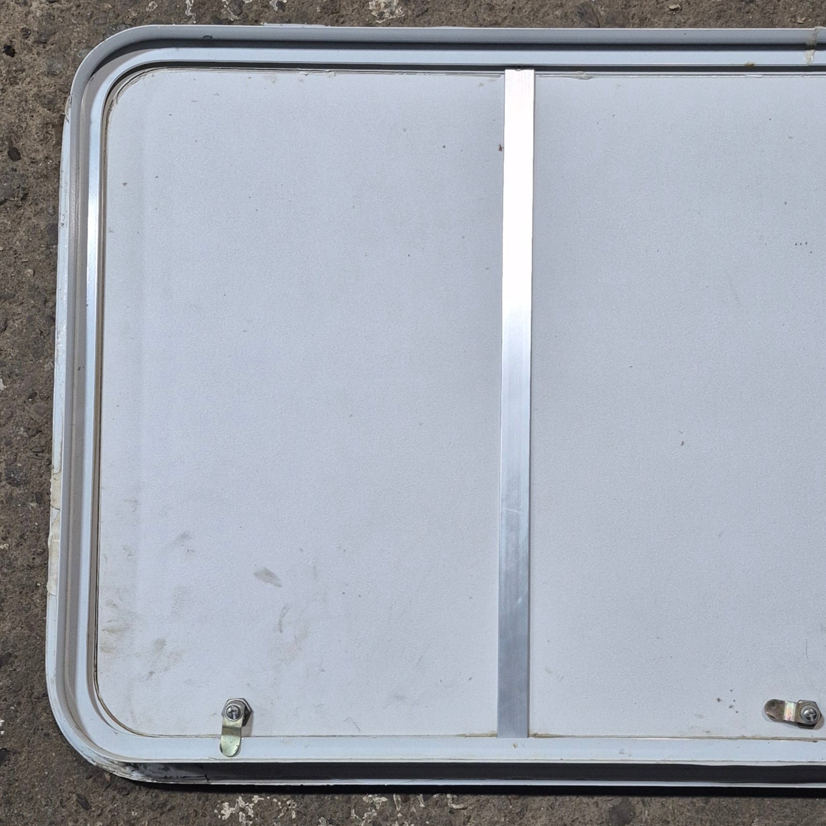 Used Radius Cornered Cargo Door 47 5/8" x 23 3/4" x 1 7/8" D - Young Farts RV Parts