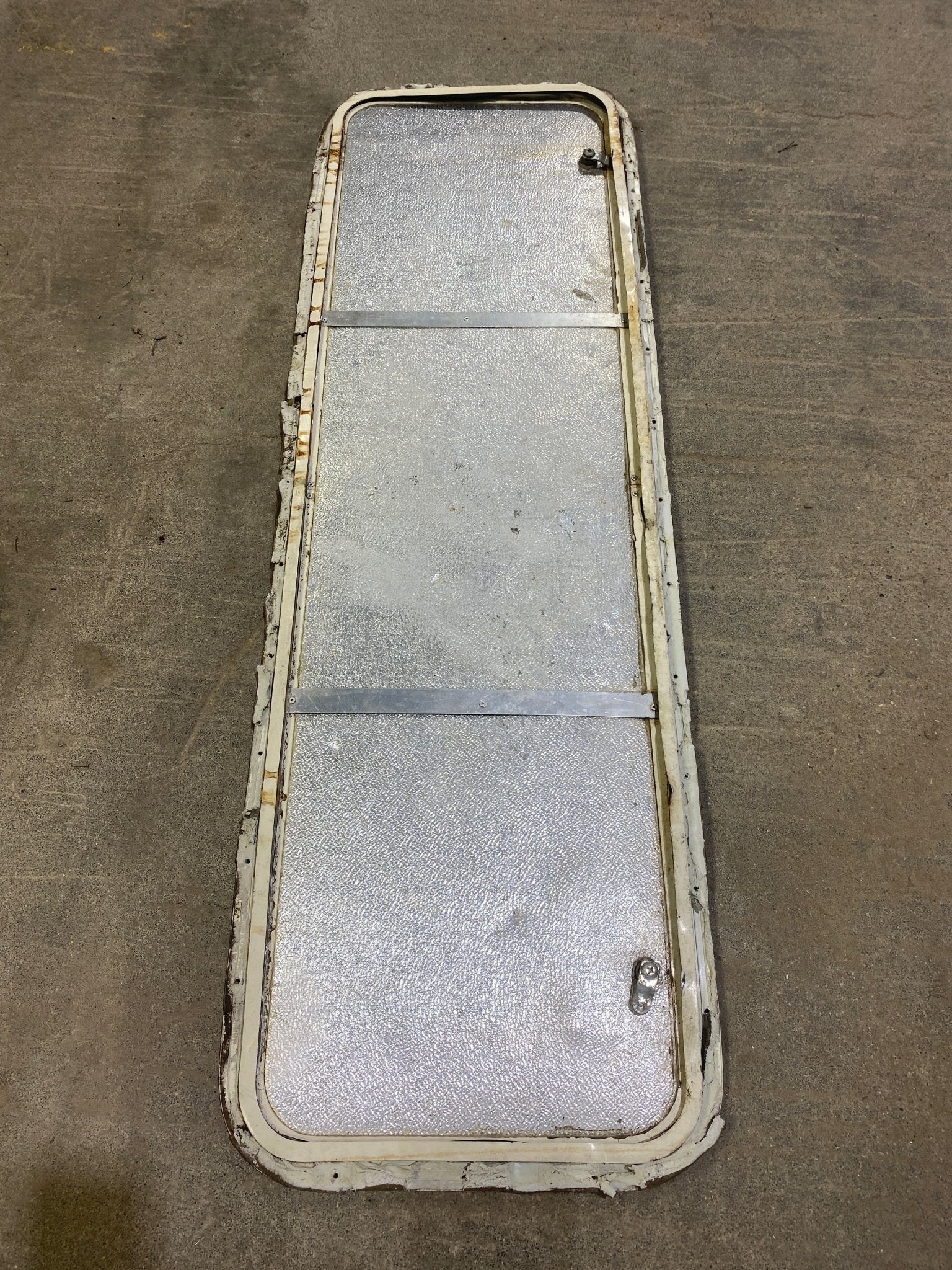 Used Radius Cornered Cargo Door 49 3/4" W x 14 3/4" H X 1/2" D - Young Farts RV Parts