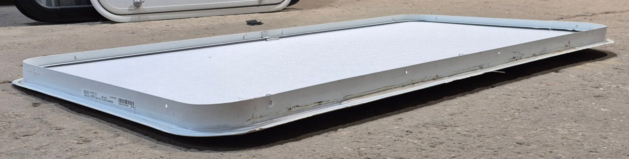 Used Radius Cornered Cargo Door 49 3/4" x 22 3/4" x 1 1/4" D - Young Farts RV Parts