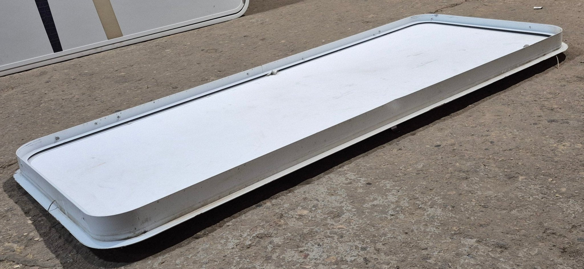 Used Radius Cornered Cargo Door 55 3/4" x 21 1/2" x 2" D - Young Farts RV Parts