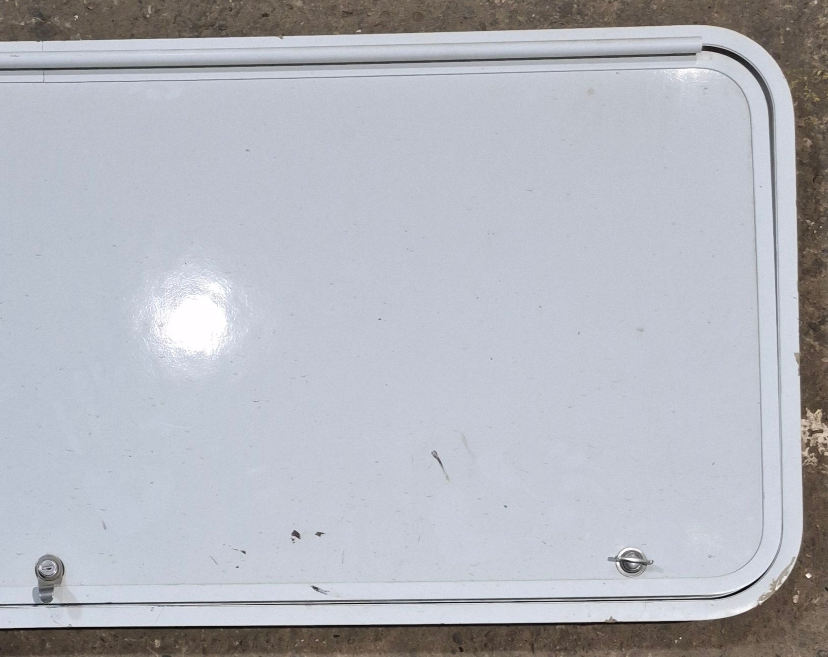 Used Radius Cornered Cargo Door 55 3/4" x 21 1/2" x 2" D - Young Farts RV Parts