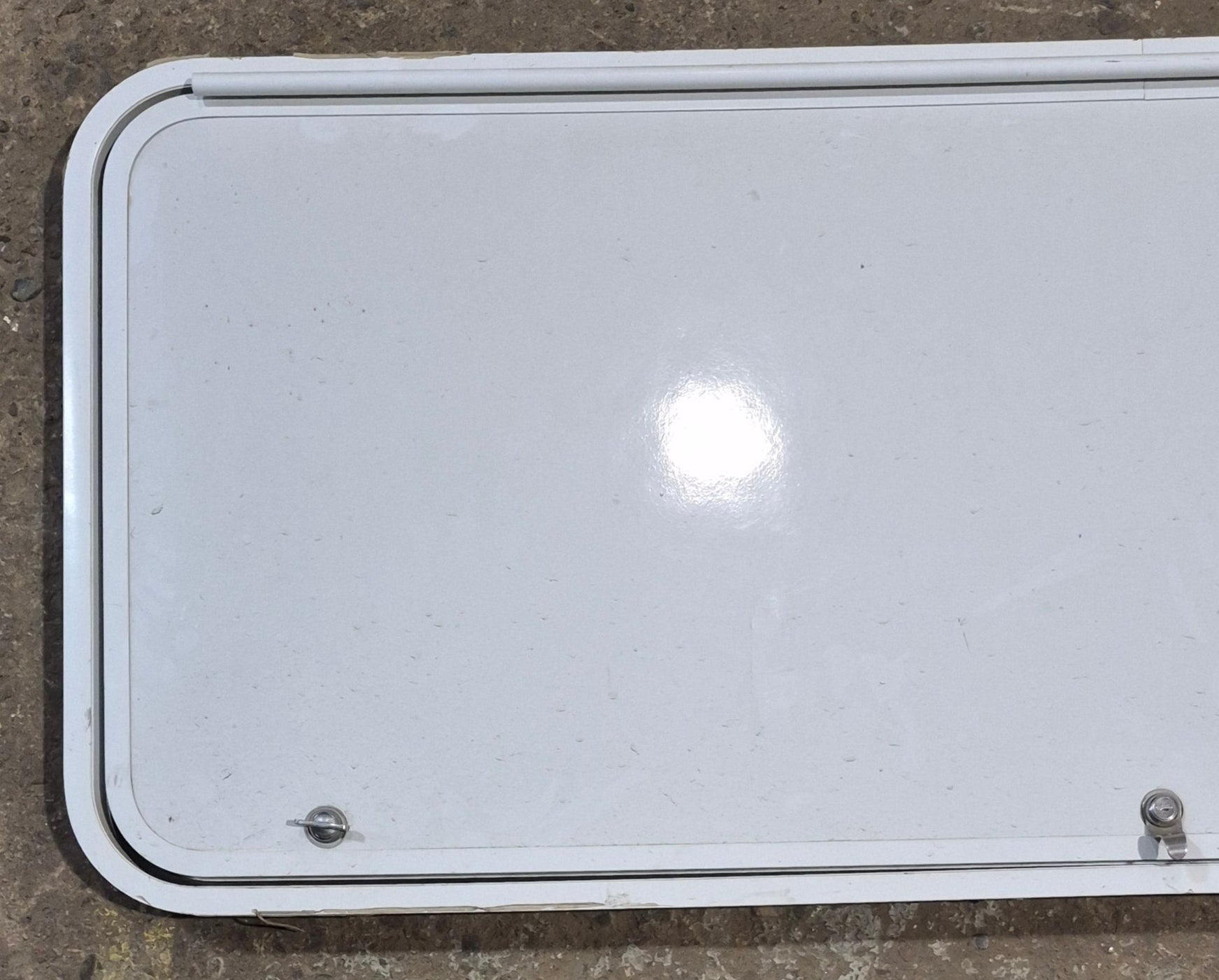 Used Radius Cornered Cargo Door 55 3/4" x 21 1/2" x 2" D - Young Farts RV Parts