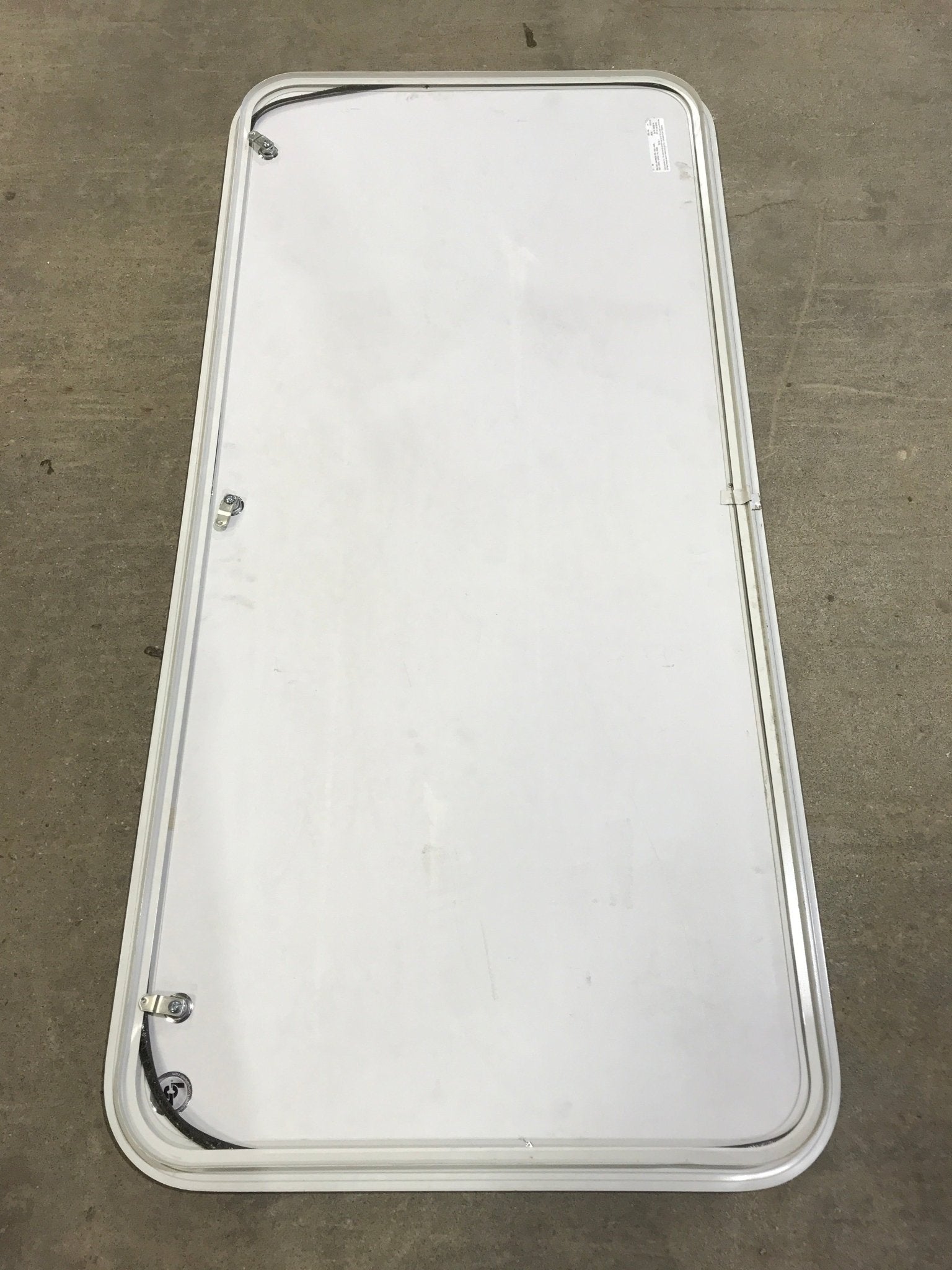 Used Radius Cornered Cargo Door 55" x 25 1/2" x 1" D - Young Farts RV Parts