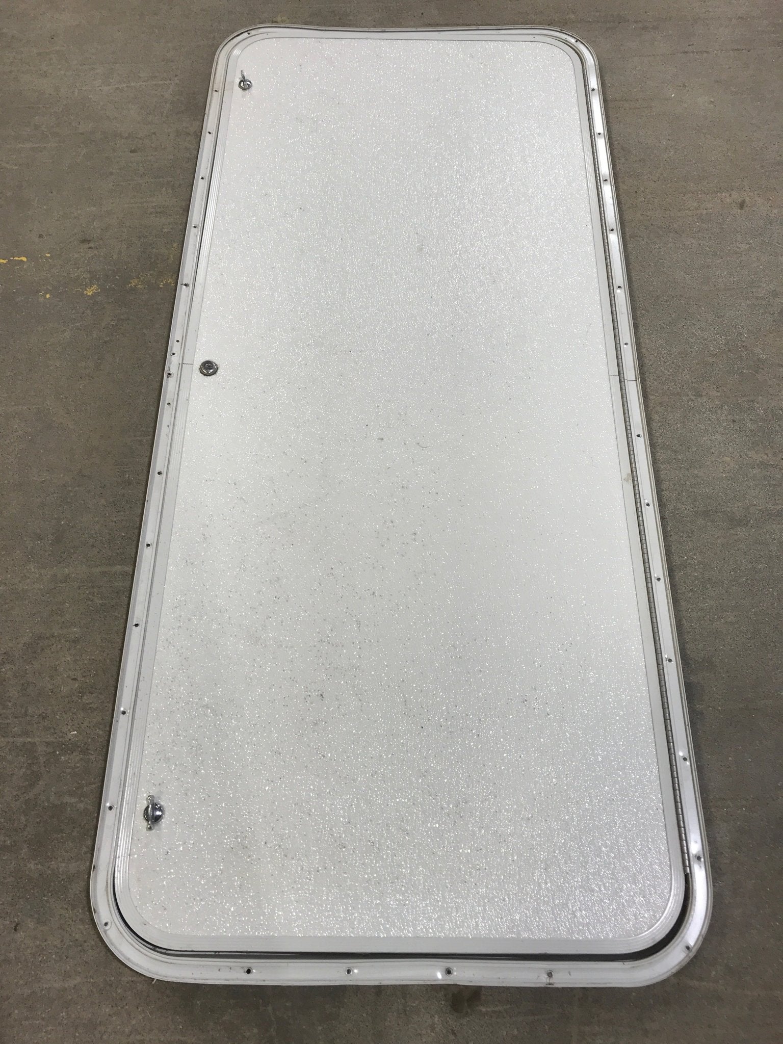 Used Radius Cornered Cargo Door 56" x 24" x 3/4" D - Young Farts RV Parts
