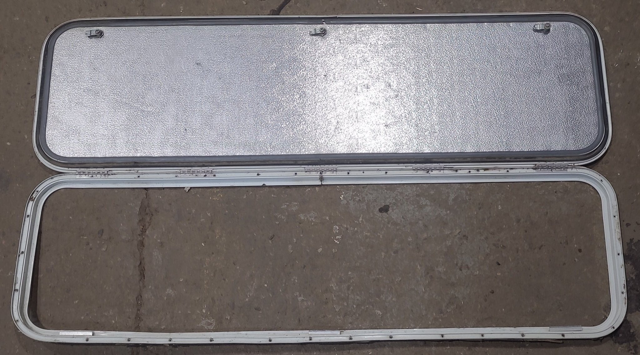 Used Radius Cornered Cargo Door 60" x 16 3/4" x 5/8" D - Young Farts RV Parts