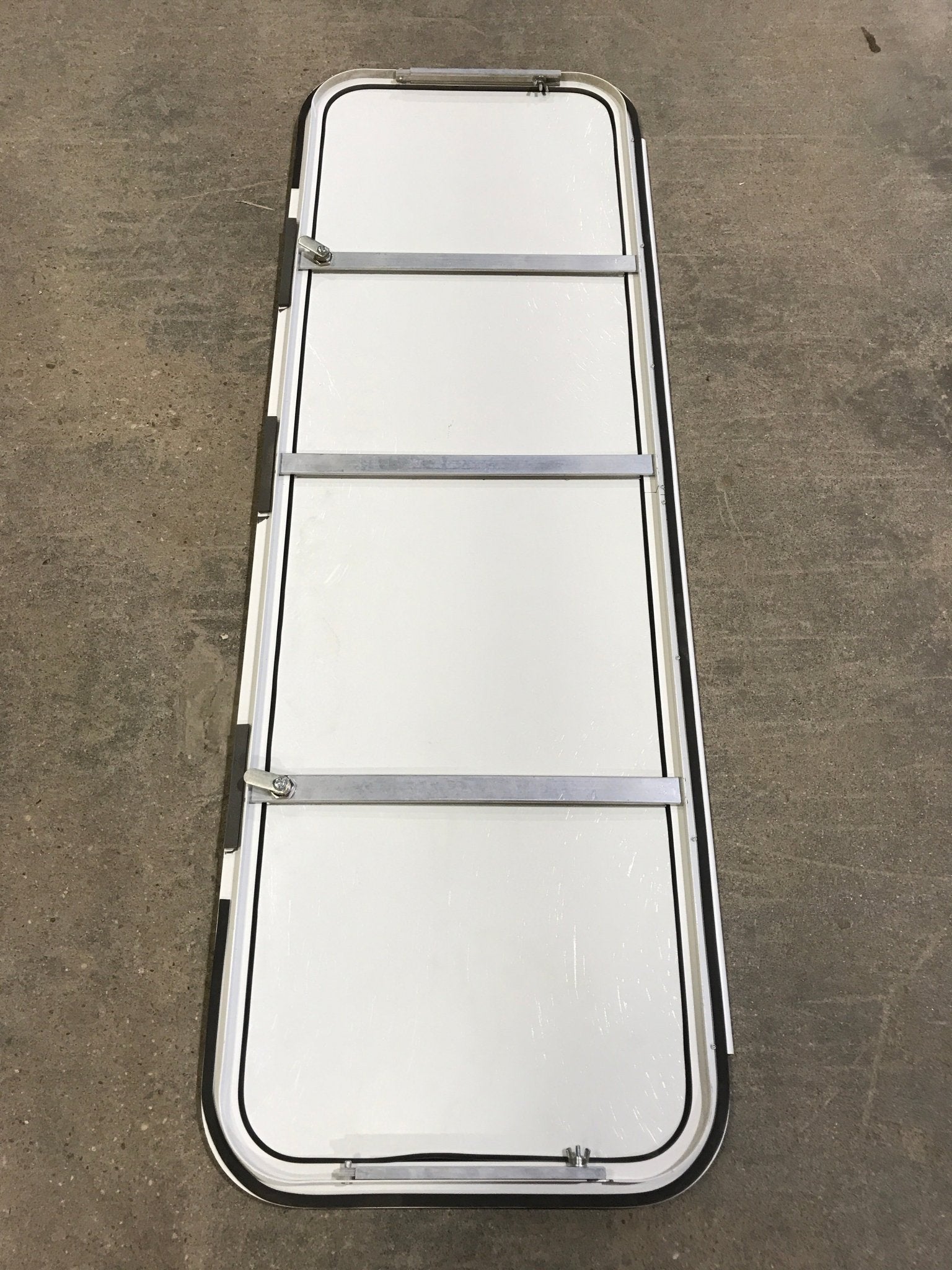 Used Radius Opening Rock Guard Cover : 52 1/2" x 16 1/2" X 3/4" D - Young Farts RV Parts