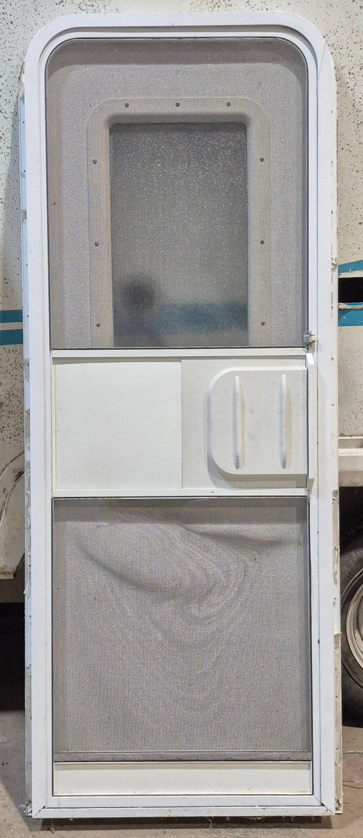 Used RV Radius Entry Door 25 3/4" W x 67 3/4" H - Young Farts RV Parts