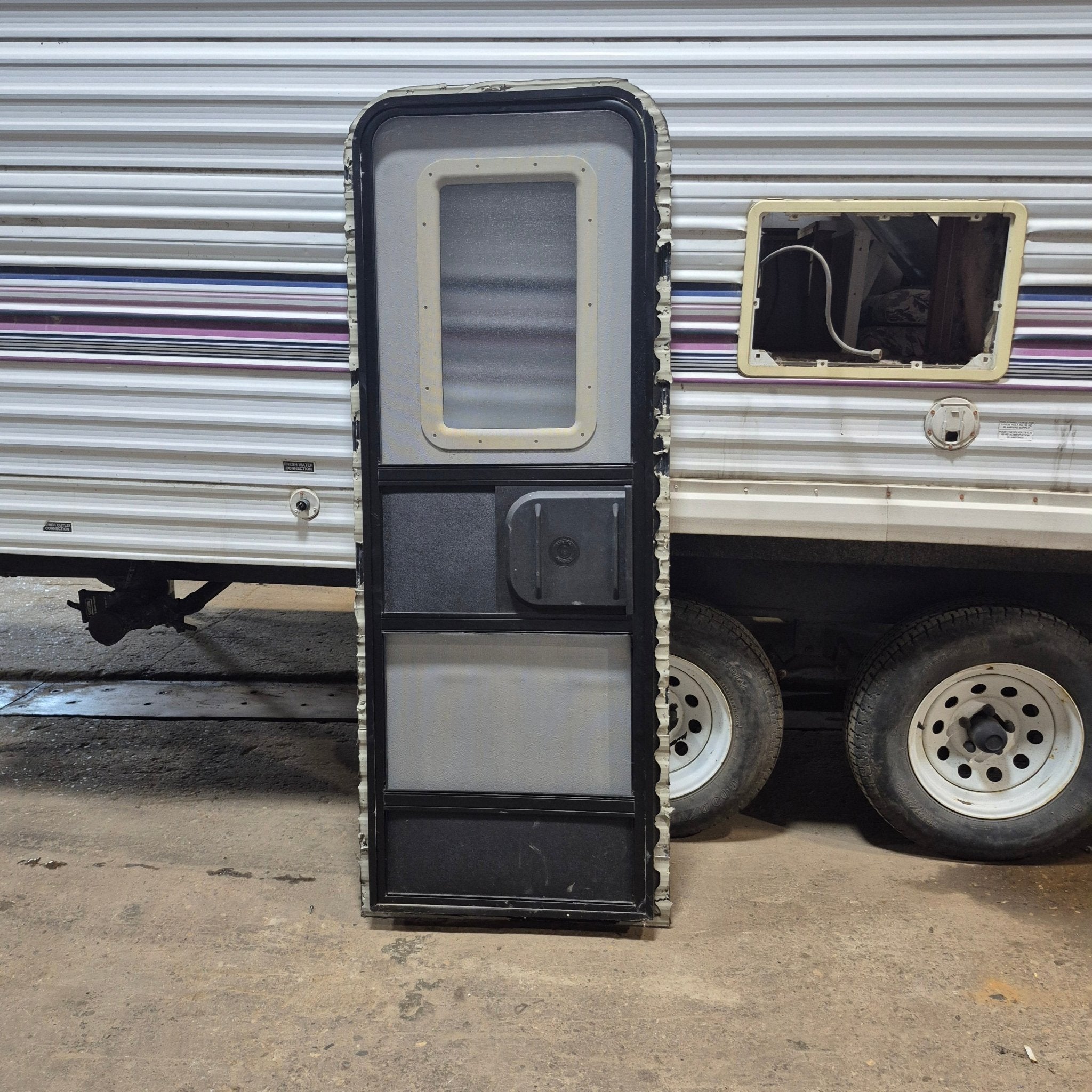 Used RV Radius Entry Door 25 3/4" W x 71 3/8" H - Young Farts RV Parts
