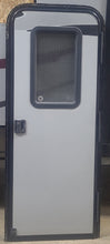 Load image into Gallery viewer, Used RV Radius Entry Door 27 5/8&quot; W x 71 1/2&quot; H - Young Farts RV Parts