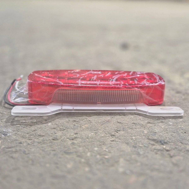 Used RV Tail Light Assembly, With License Plate Bracket, 8.625" x 4.125" x 1.25"- DOT SAE A2I6S2T2L 18 - Young Farts RV Parts