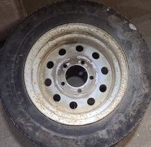 Load image into Gallery viewer, Used RV Tire &amp; Rim 13&quot; 5 bolt - Tire no good, Rim only! - Young Farts RV Parts