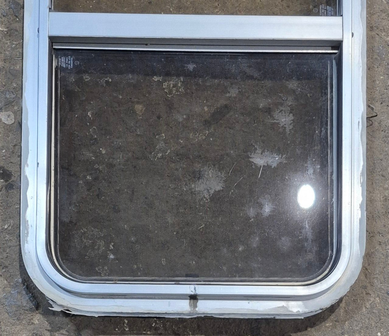 Used Silver Radius Opening Window : 16" W x 27 1/2" H x 1 3/4" D - Young Farts RV Parts