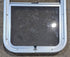 Used Silver Radius Opening Window : 16" W x 27 1/2" H x 1 3/4" D - Young Farts RV Parts