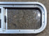 Used Silver Radius Opening Window : 26 1/2" W x 8 1/2" H x 1 3/4" D - Young Farts RV Parts