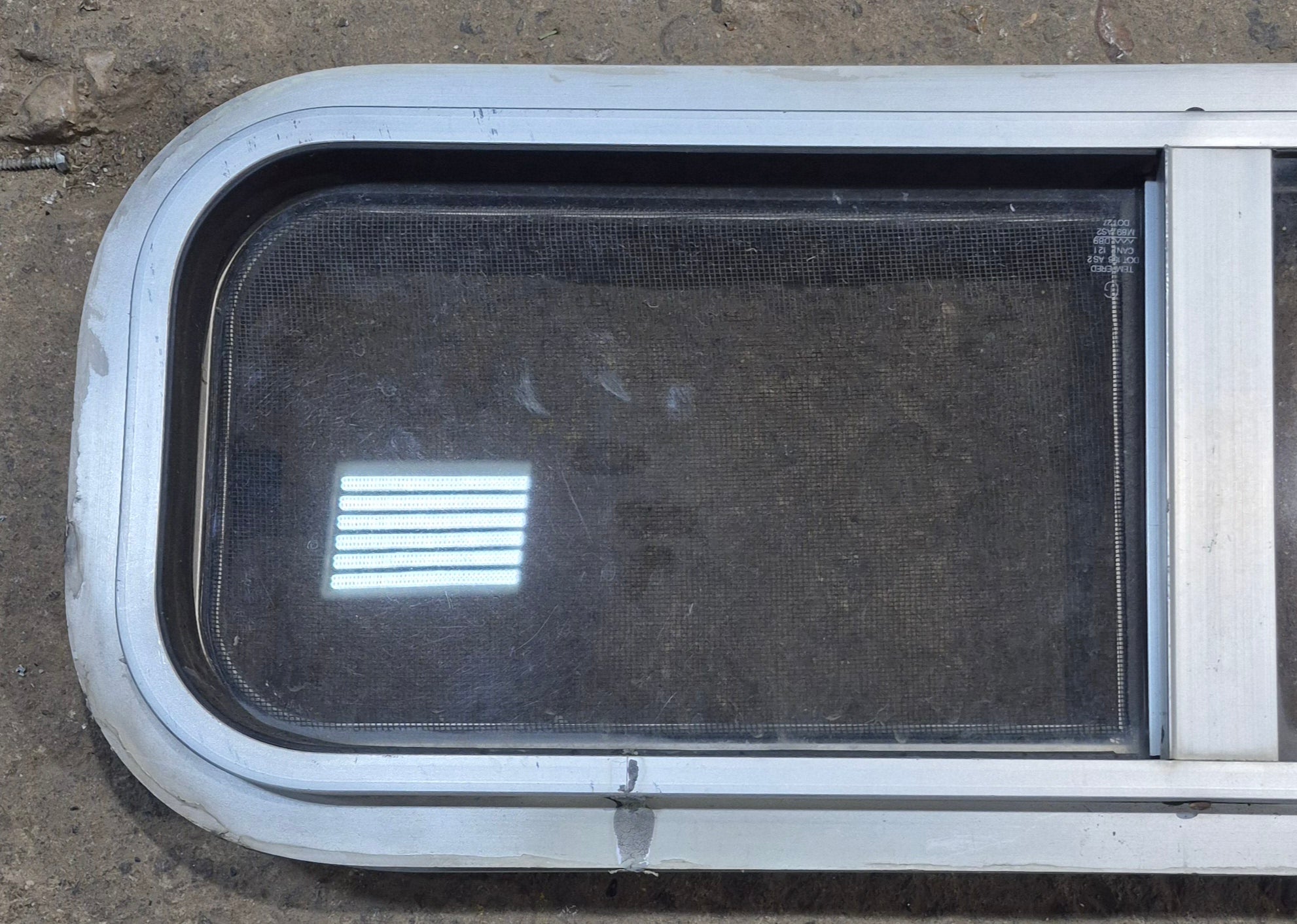 Used Silver Radius Opening Window : 26 1/2" W x 8 1/2" H x 1 3/4" D - Young Farts RV Parts