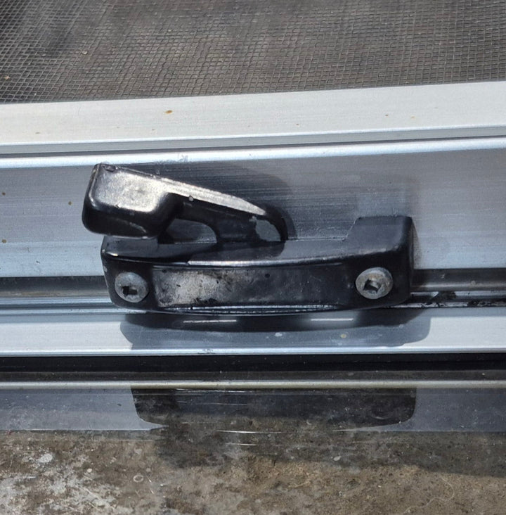 Used Silver Radius Opening Window : 26 1/2" W x 8 1/2" H x 1 3/4" D - Young Farts RV Parts
