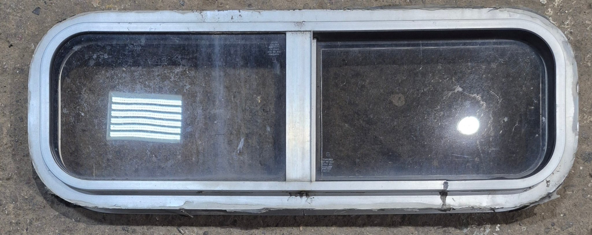 Used Silver Radius Opening Window : 26 1/2" W x 8 1/2" H x 1 3/4" D - Young Farts RV Parts