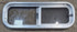 Used Silver Radius Opening Window : 26 1/2" W x 8 1/2" H x 1 3/4" D - Young Farts RV Parts