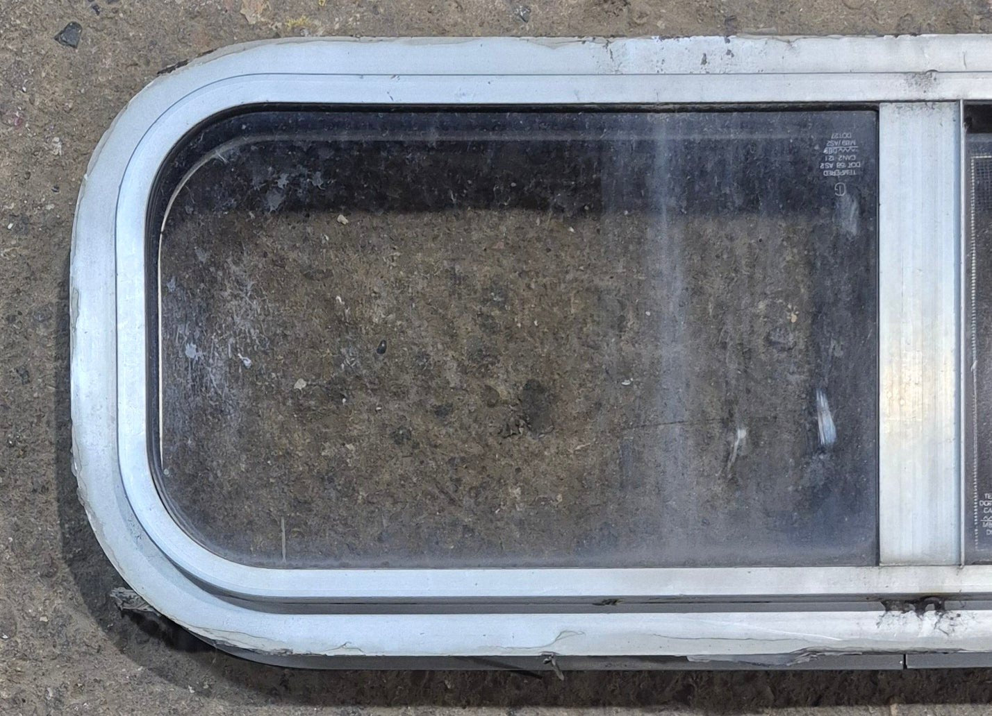 Used Silver Radius Opening Window : 26 1/2" W x 8 1/2" H x 1 3/4" D - Young Farts RV Parts