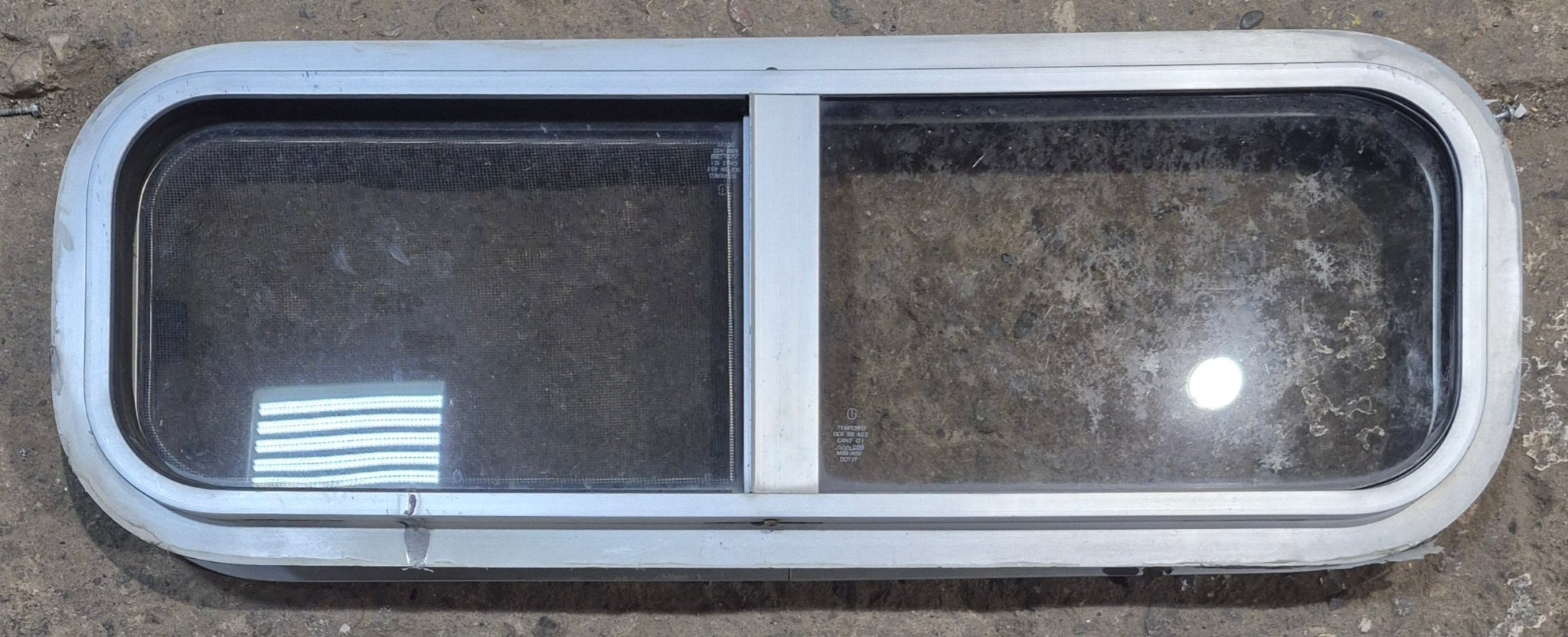 Used Silver Radius Opening Window : 26 1/2" W x 8 1/2" H x 1 3/4" D - Young Farts RV Parts