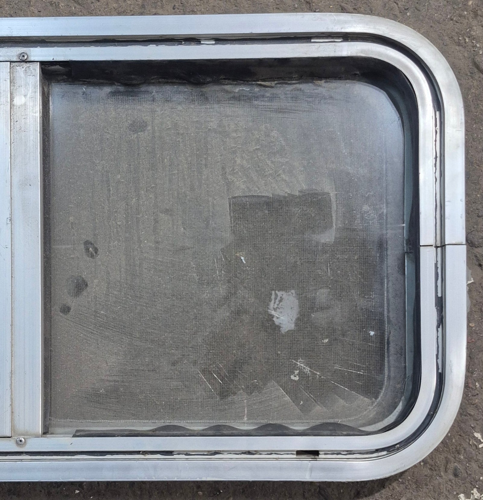 Used Silver Radius Opening Window : 29 1/4 X 14 1/4 X 2" D - Young Farts RV Parts