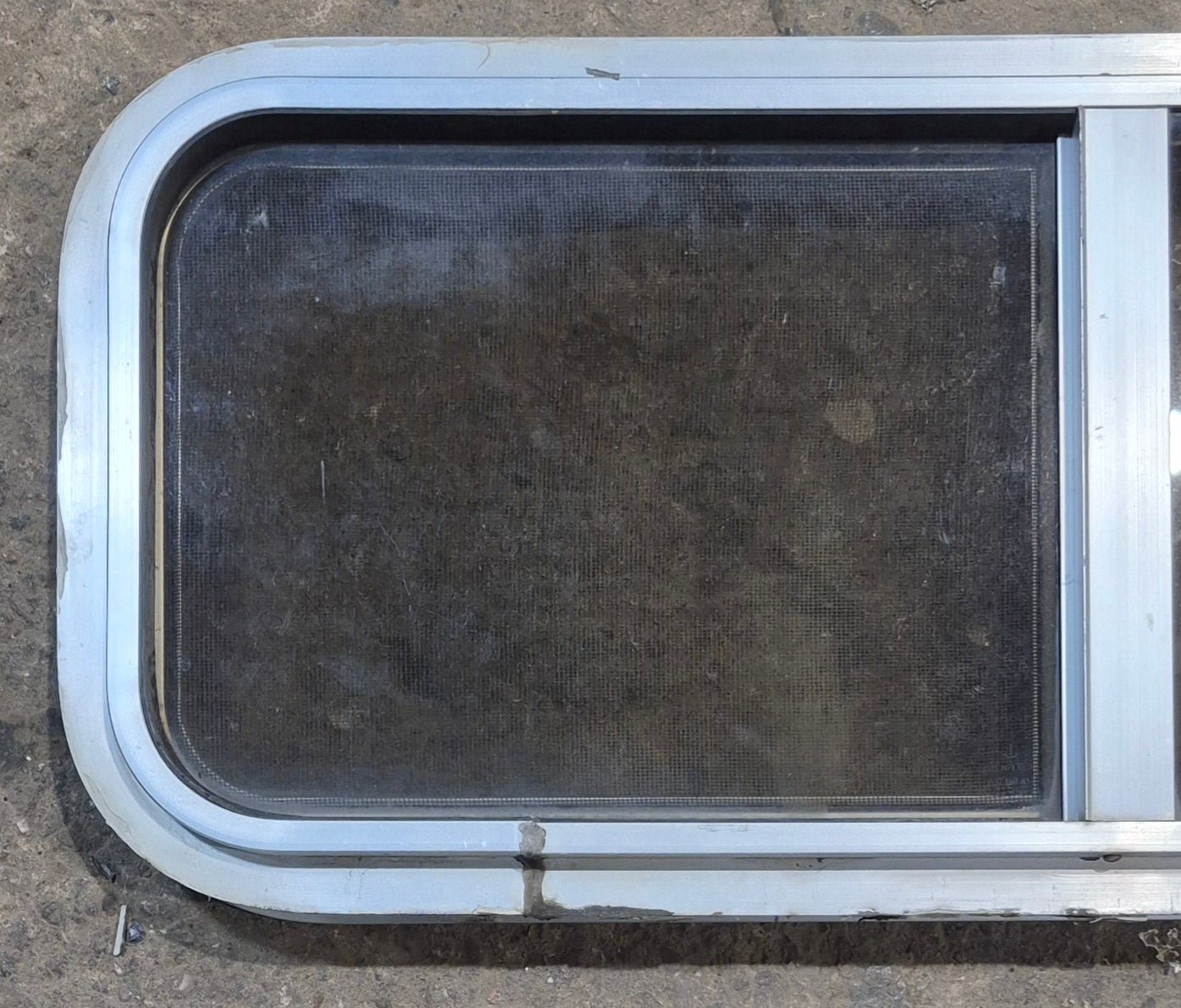 Used Silver Radius Opening Window : 30" W x 11 1/2" H x 1 3/4" D - Young Farts RV Parts