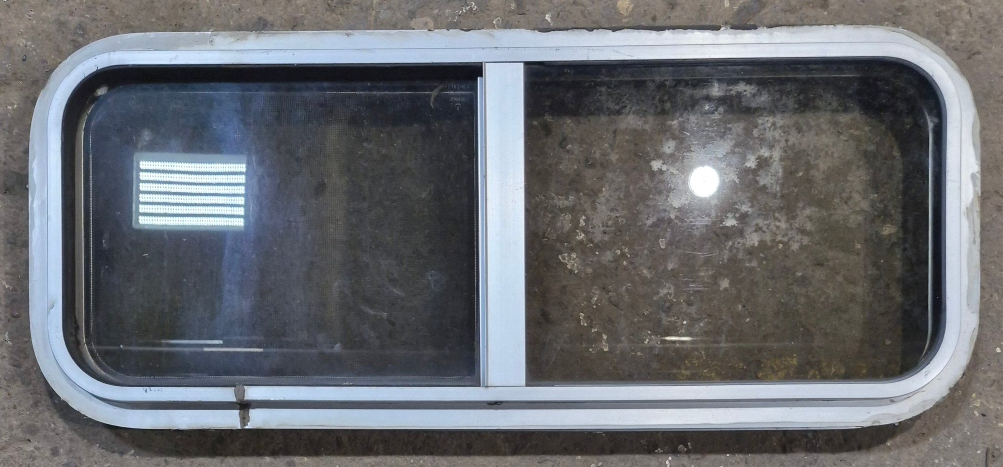 Used Silver Radius Opening Window : 30" W x 11 1/2" H x 1 3/4" D - Young Farts RV Parts